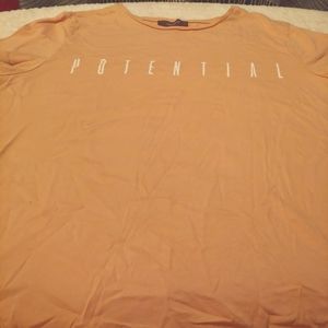 Pale peach potential tee